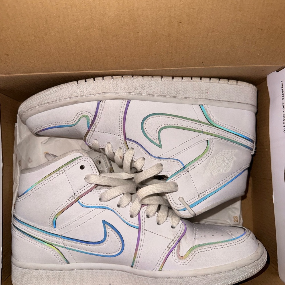 Black and white air Jordan mids